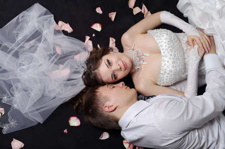 portrait of the newlyweds on studio shooting の写真素材