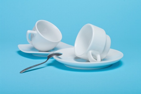 two cups on a blue backgroundの写真素材