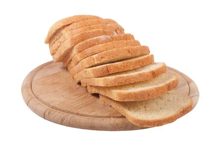 sliced bread on a board on a white backgroundの写真素材