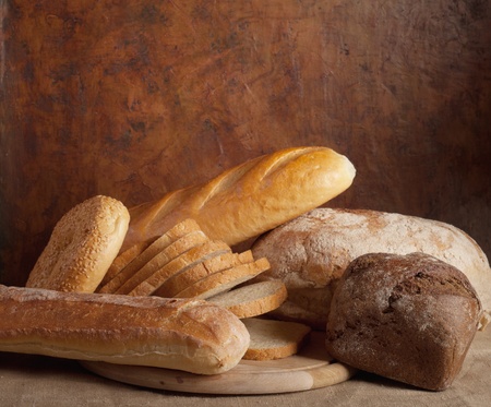 different types of bread on a dark backgroundの写真素材