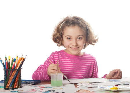 Little child, drawing paint. Isolated on white の写真素材