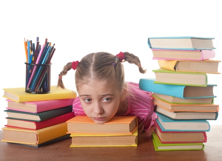 sad  little girl and booksの写真素材