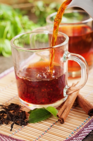 Cup of fresh tea on the table. Selective focus の写真素材