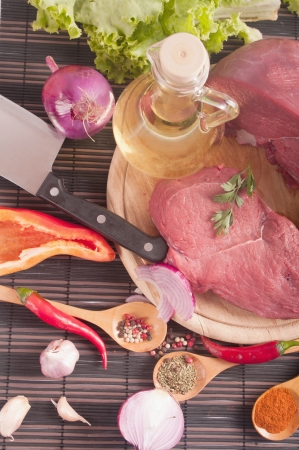 Raw fresh meat on boardの写真素材