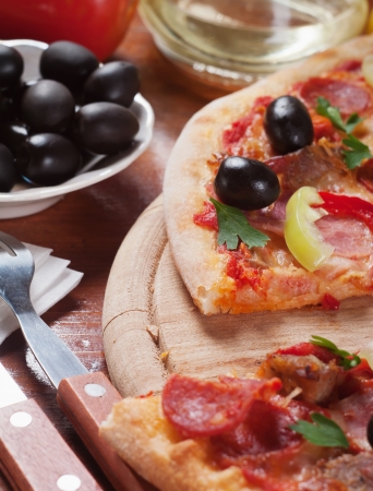 Tasty Italian pizza on the tableの写真素材