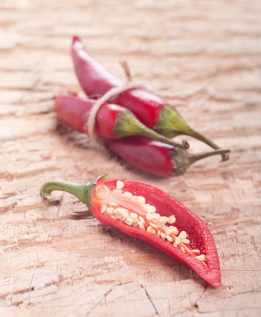 red chili pepper on wooden table  Selective focus の写真素材