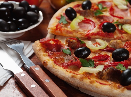 Tasty Italian pizza on the table の写真素材