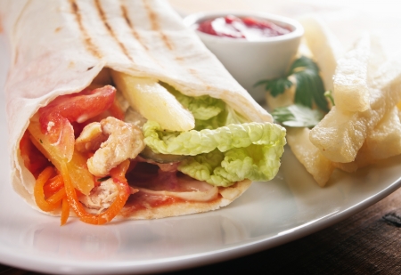 kebab sandwich with french fries の写真素材