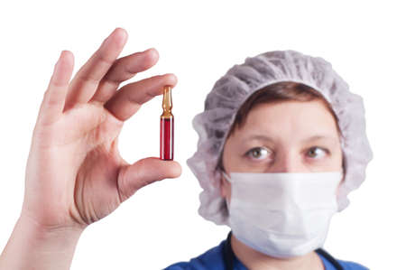 doctor holding ampoule の写真素材
