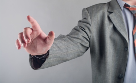  business man pushing an imaginary buttonの写真素材