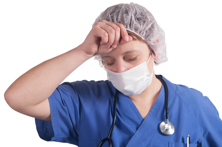 tired doctor isolated on whiteの写真素材