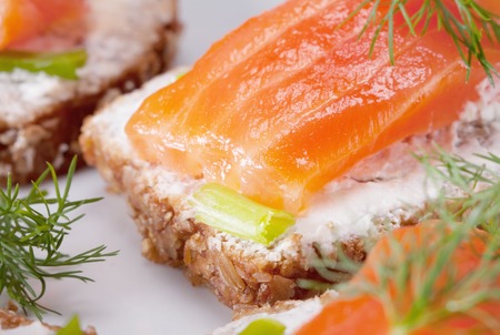 Delicious canape with smoked salmonの写真素材