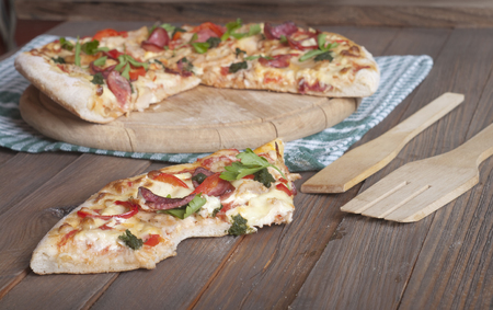 italian pizza on wooden tableの写真素材