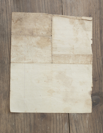old sheet of paper on the wallの写真素材
