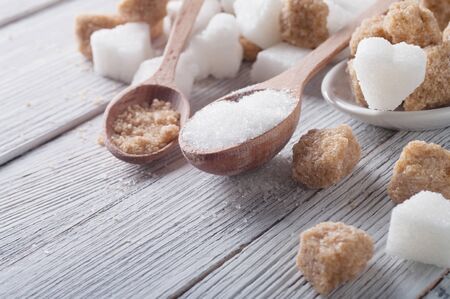 white and brown sugar close-upの写真素材