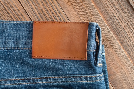 jeans on a wooden backgroundの写真素材