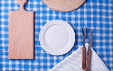 Empty plate on tableclothの写真素材