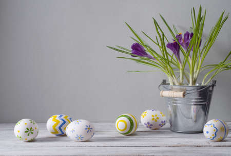 Easter still life with eggs and spring flowersの写真素材