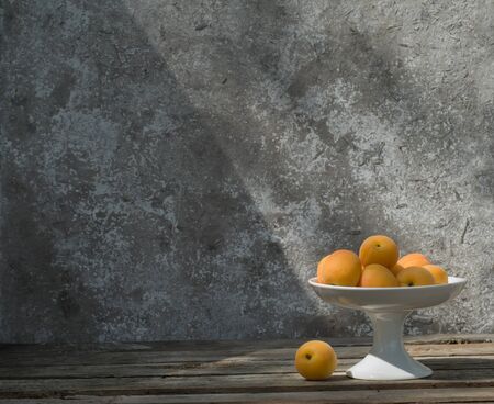 Still life with apricotsの写真素材