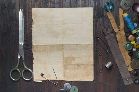 vintage buttons on old wooden tableの写真素材