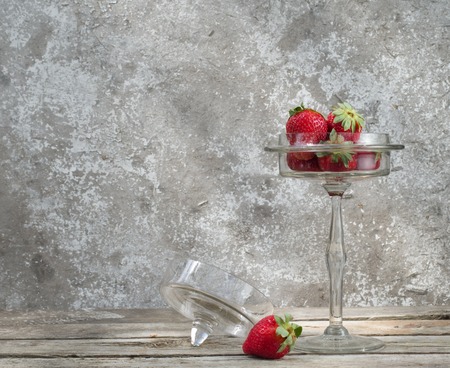 Still Life with strawberries in a glass vaseの写真素材