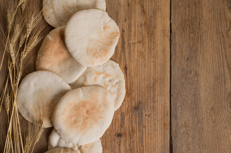 pita bread on a wooden background