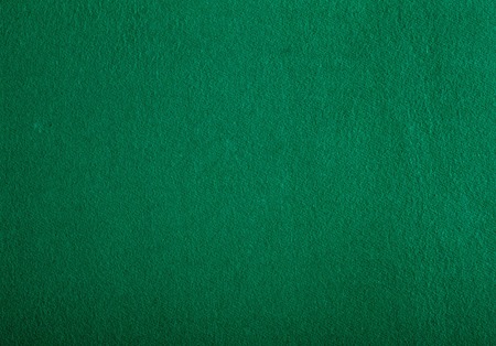 Poker table felt background in green colorの写真素材