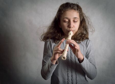 Girl Playing Flute