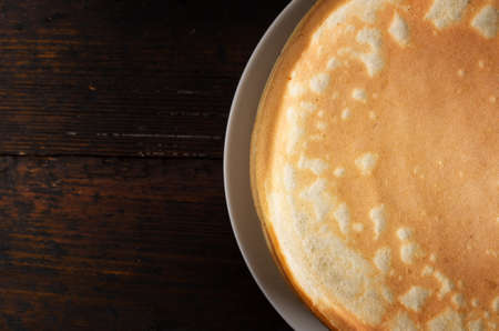 Pancakes on a wooden table