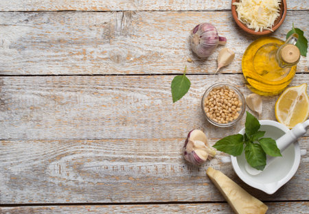 Homemade basil pesto sauce with fresh ingredients.の写真素材