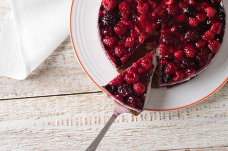 fruit cake with berries and other fruits