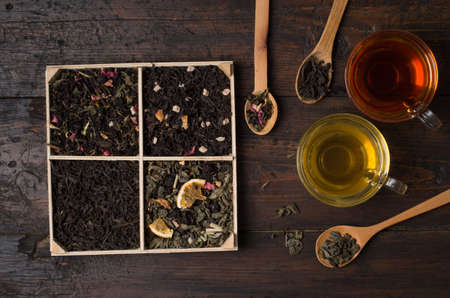 various types of tea on a wooden backgroundの写真素材