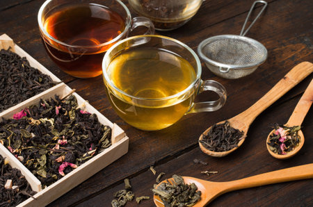 various types of tea on a wooden backgroundの写真素材