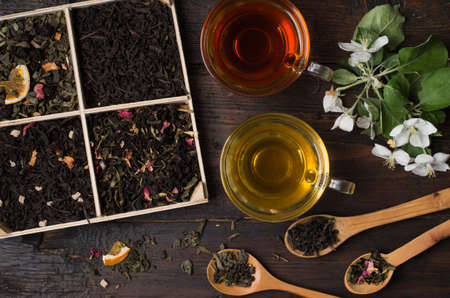 various types of tea on a wooden backgroundの写真素材
