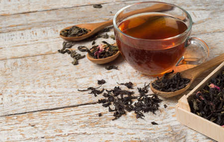 various types of tea on a wooden backgroundの写真素材