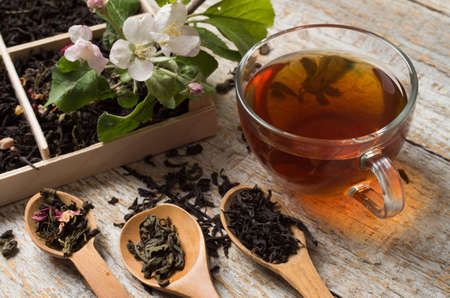 various types of tea on a wooden backgroundの写真素材
