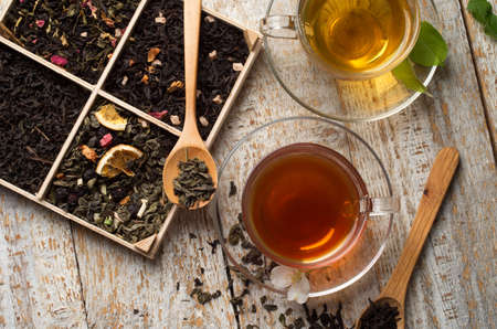 various types of tea on a wooden backgroundの写真素材