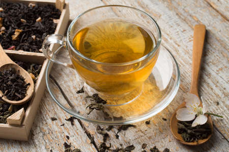 various types of tea on a wooden backgroundの写真素材