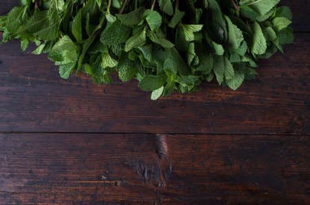 Fresh mint on rustic wooden backgroundの写真素材
