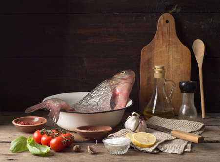 Delicious fresh fish and herbs and spices. Still life.の写真素材