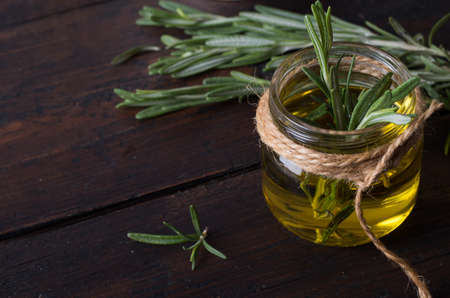 Essential oil of rosemary with fresh green leavesの写真素材