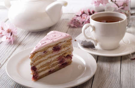 Pink cake on a wooden tableの写真素材