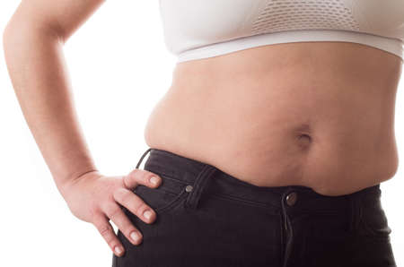 Fat woman isolated over whiteの写真素材