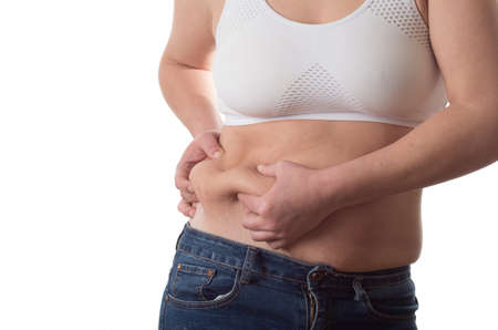 Fat woman isolated over whiteの写真素材