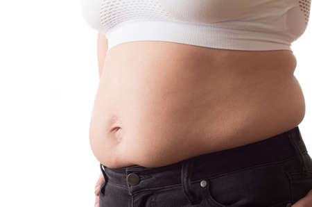 Fat woman isolated over whiteの写真素材