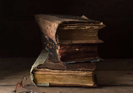 Old antique book on a wooden table