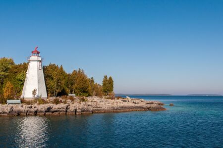 Lighthouse on shore of lake Huron