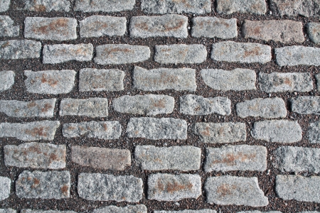 Natural gray granite stone pavement backgroundの写真素材
