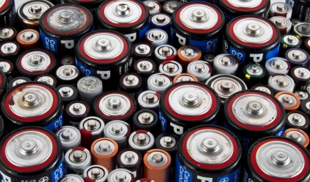 Full of used different type and size batteriesの写真素材