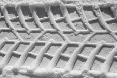 Tire tracks pattern prints in the snow